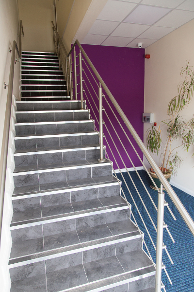 stairs carped and tiled, walls painted