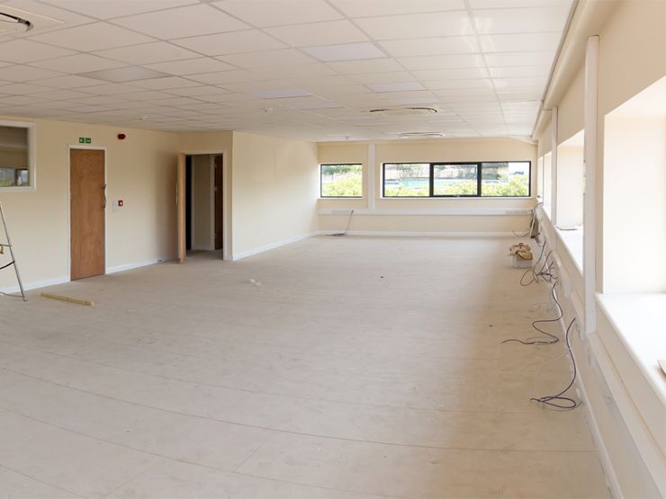 office area decorated with trunking added, electrics and data installed