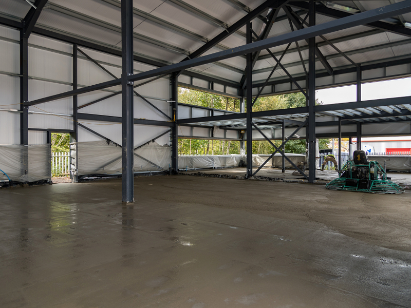 pouring completed, the flattening of the floor is nearly complete