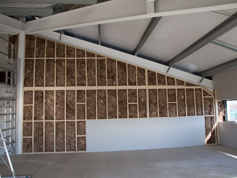partition wall constructed and insulation being added